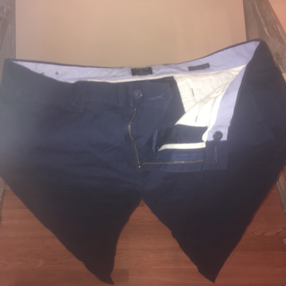 Men’s navy blue J. Crew summerweight chino pants.